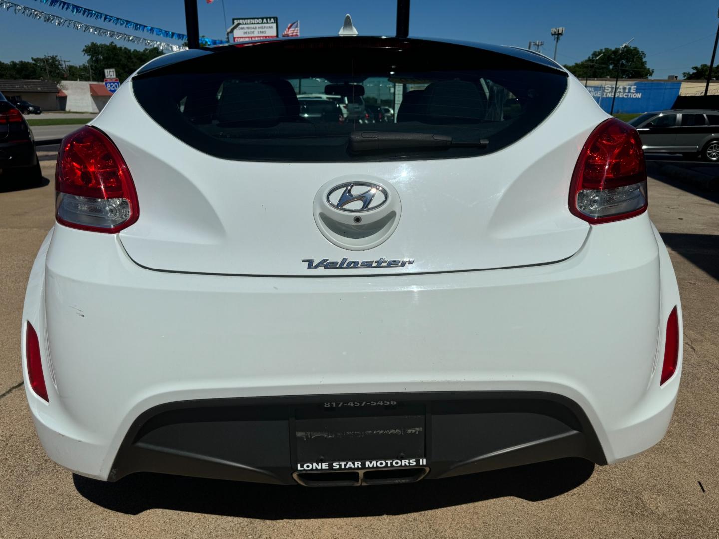 2016 WHITE /Gray HYUNDAI VELOSTER Base 3dr Coupe (KMHTC6AD7GU) with an 1.6L I4 engine, Automatic 6-Speed transmission, located at 5900 E. Lancaster Ave., Fort Worth, TX, 76112, (817) 457-5456, 0.000000, 0.000000 - This is a 2016 Hyundai Veloster Base 3dr Coupe that is in excellent condition. There are no dents or scratches. The interior is clean with no rips or tears or stains. All power windows, door locks and seats. Ice cold AC for those hot Texas summer days. It is equipped with a CD player, AM/FM radio, A - Photo#5